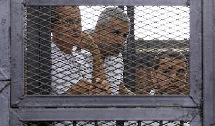 00E897-NEWS_120339 Tre giornalisti di Al Jazeera condannati a 7 anni di carcere
