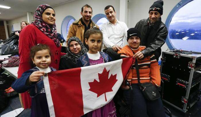 0004B8B3-migranti-siriani-arrivati-in-canada Migranti siriani arrivati in Canada