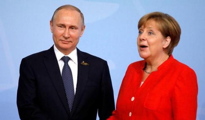 Vladimir Putin e Angela Merkel