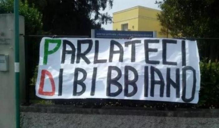 Un cartello su Bibbiano
